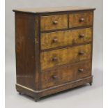 A Victorian walnut chest of two short and three graduated long drawers, on a plinth base and bun