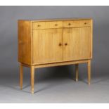 A mid-20th century teak side cabinet by Gordon Russell Limited, probably designed by David Booth and