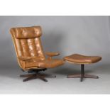 A mid-20th century Swedish brown leather revolving easy armchair and matching footstool by Gote