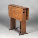 An Edwardian Arts and Crafts oak drop-flap occasional table, possibly by Liberty & Co, the flared
