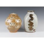 A Continental studio pottery salt glazed ovoid jar and cover with trailed, brushdrawn and