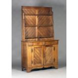 A late Victorian Aesthetic period oak dresser, in the manner of Charles Bevan, the shelf back