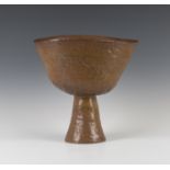 A studio pottery spade vase, attributed to Alma Ramsey, decorated in a mottled brown glaze, height