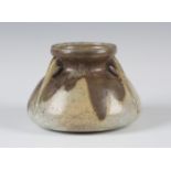 A Charles Greber studio pottery vase, circa 1910, the tapering compressed circular body applied with