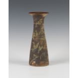 A Bryan Newman, Aller studio pottery vase, the trumpet form body decorated with trailed matt