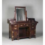 An Edwardian Arts and Crafts mahogany dressing chest, possibly Glasgow School, with overall copper