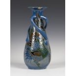 A C.H. Brannam art pottery vase, dated 1910, by Frederick Bowden, monogrammed, the ovoid body