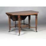 A late Victorian Aesthetic period walnut drop-flap centre table by 'C. Hindley & Sons', in the
