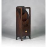 An Edwardian Arts and Crafts Glasgow School mahogany magazine rack, probably by Wylie & Lochhead,