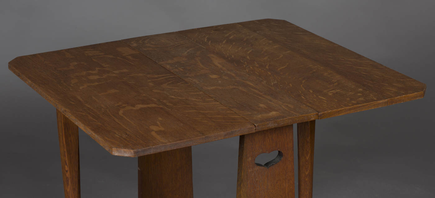 An Edwardian Arts and Crafts oak drop-flap occasional table, possibly by Liberty & Co, the flared - Image 2 of 2
