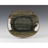 A Margaret Leach, Taena studio pottery oval dish with brown feathering over a bluish-grey glaze,