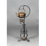 A late Victorian Arts and Crafts copper and brass mounted kettle by Benham & Froud, maker's marks to