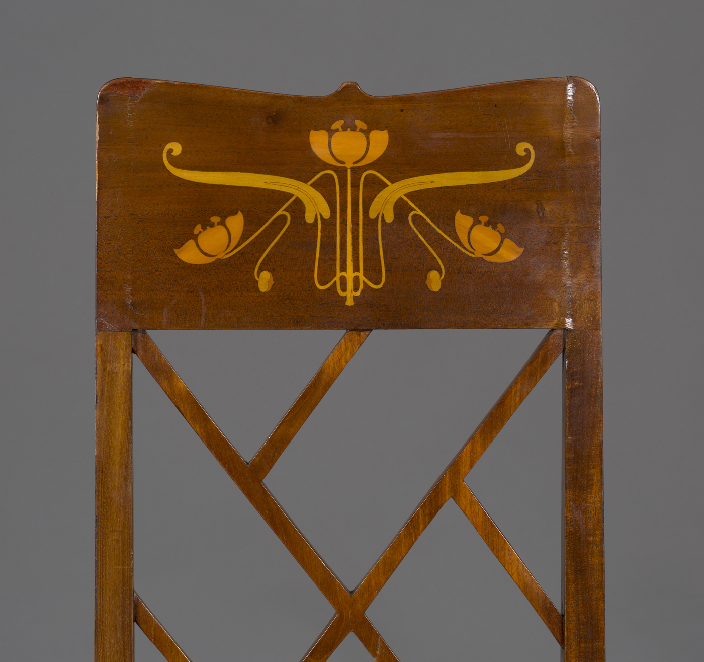 An Edwardian Arts and Crafts mahogany and foliate inlaid elbow chair, possibly by J.S. Henry, the - Image 3 of 3