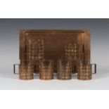 A set of mid-20th century copper tea glasses by Sigg, Switzerland, the six pierced copper holders