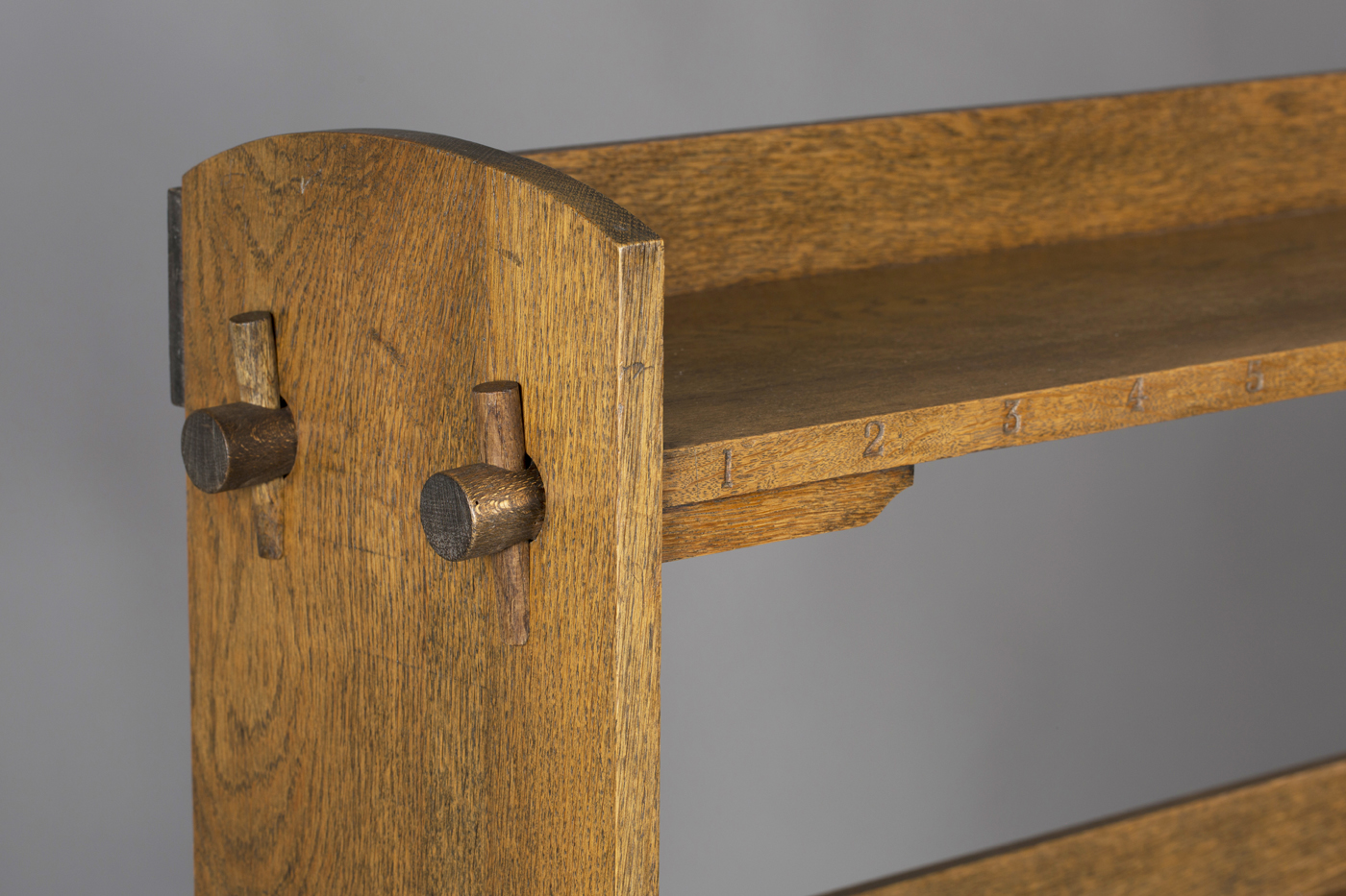 An early 20th century Arts and Crafts oak four-tier open bookcase of pegged construction, probably - Image 2 of 2