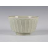A Trevor Corser, St Ives studio pottery bowl, the fluted body decorated in a celadon glaze,