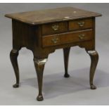 A 19th century Queen Anne style walnut lowboy, the crossbanded top above three drawers, raised on