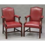 A pair of 20th century George III style mahogany framed Gainsborough style armchairs, upholstered in