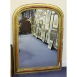 A mid-19th century gilt framed overmantel mirror with a beaded arch frame, 143cm x 103cm.Buyer’s