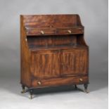 A late George III mahogany dwarf open waterfall bookcase cabinet with overall boxwood stringing, the