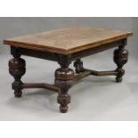 A large mid/late 19th century oak drawleaf refectory table, the rectangular top parquetry veneered