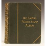 The Empire Postage Stamp Album and a small box of various world stamps.Buyer’s Premium 29.4% (