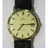 An Omega 9ct gold circular cased gentleman's wristwatch, the signed silvered dial with baton hour