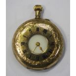 A 9ct gold half-hunting cased keyless wind lady's fob watch with a gilt jewelled lever movement,