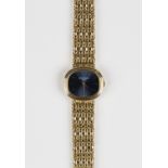 A Patek Philippe Ellipse 18ct gold oval cased lady's bracelet wristwatch, the signed blue metallic