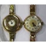 A 9ct gold half-hunting cased lady's wristwatch with an unsigned jewelled lever movement, the