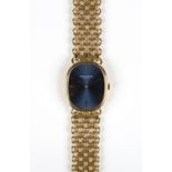 A Patek Philippe Ellipse 18ct gold oval cased gentleman's bracelet wristwatch, the signed blue