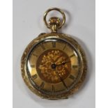 An 18ct gold keyless wind open-faced lady's fob watch with a gilt cylinder movement, the case back