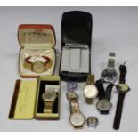 A Smiths Astral 9ct gold circular cased gentleman's wristwatch, the case back presentation