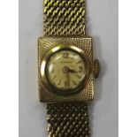 A Longines 9ct gold rectangular cased lady's bracelet wristwatch with a signed jewelled movement,