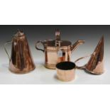 An Edwardian copper watering can, a late Victorian copper tappit lidded flagon, a copper mould and a