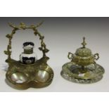 A Victorian brass and mother-of-pearl inset inkstand, fitted with a porcelain well, width 16cm,