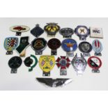 A group of twenty assorted car badges, including BRDC Silverstone Club by Marples, Nürburg-ring,