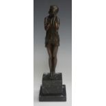 A late 20th century brown patinated cast bronze figure of an Art Deco style lady, raised on a