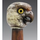 A late 20th century painted cast resin handled walking cane, the handle in the form of a parrot's