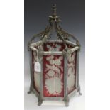 A late 19th century zinc framed hexagonal hanging hall lantern, each side inset with red flashed and