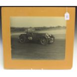 A black and white photograph of a 1930s 1.5ltr Aston Martin, Number 139, detailed 'Photo - Guy