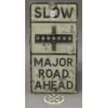 A cast metal 'Slow, Major Road Ahead' sign, inset with reflectors, 70cm x 36cm, together with a