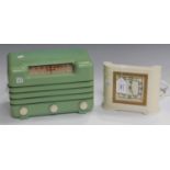 An Art Deco cream plastic Smiths electric timepiece, width 18cm, together with a Masteradio '