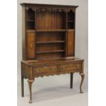 A 19th century oak and chequer inlaid dresser, the shelf back with pierced frieze and two cupboards,