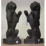 A pair of 20th century heavy cast iron models of lions rampant, height 36cm.Buyer’s Premium 29.4% (