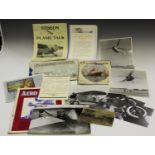 A small group of aeronautical and shipping related ephemera, a selection of black and white