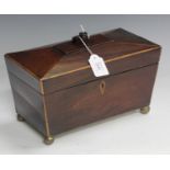An early 19th century mahogany and boxwood banded tea caddy of sarcophagus form, width 33cm.Buyer’