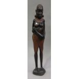 A 20th century African carved hardwood figure of a woman holding a gourd, height 95cm.Buyer’s