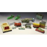 A collection of die-cast vehicles and accessories, including a Dinky Toys Centurion tank and various