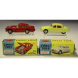 A Corgi Toys No. 208S Jaguar 2.4 litre saloon, finished in yellow with smooth hubs, and a No. 218